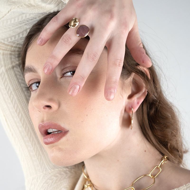 Thumbnail of Pink Gemstone Huggie Earrings | Gold Sculptural Hoops image