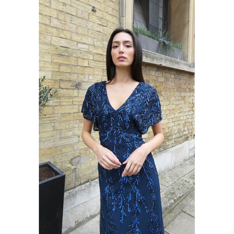 Thumbnail of Serenity A Flattering V Neckline, Tie Up Back, Cap Sleeve & All Over Hand Embellishments Blue Gown image