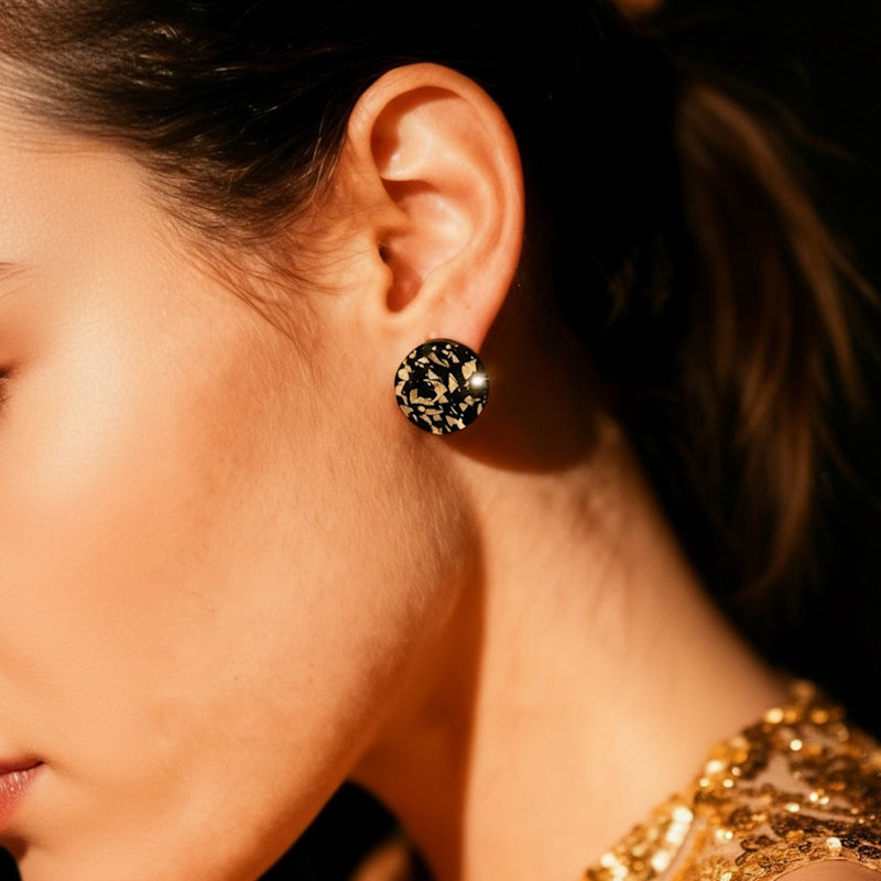 Thumbnail of Small Round Studs In Black & Gold Glitter image