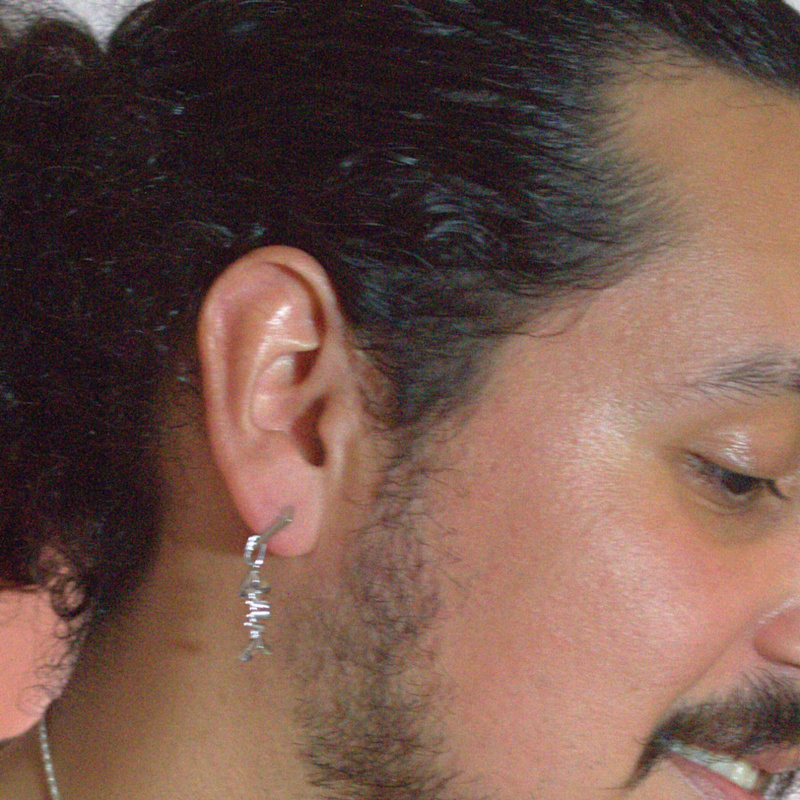 Thumbnail of Mars Sterling Silver Reversible Fish Bone Huggie Earring Single image