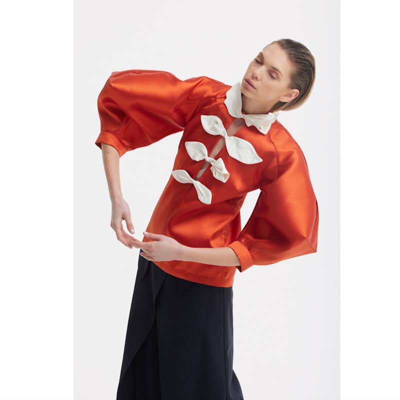Thumbnail of Taffeta Deep V-Neck Blouse With Satin Floral Detail – Terracotta image