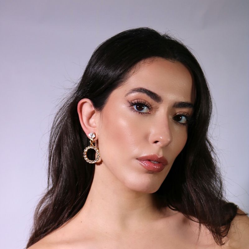 Thumbnail of The Small Clear Hoop Earrings In Gold - Clip image