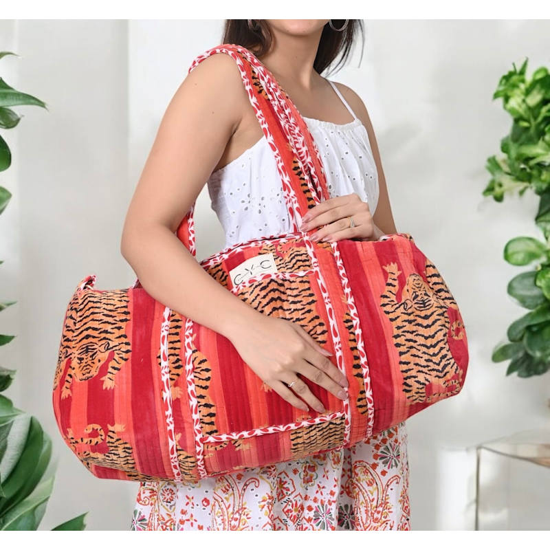 Thumbnail of The Tibetan Tiger Velvet Weekender - Orange And Pink image