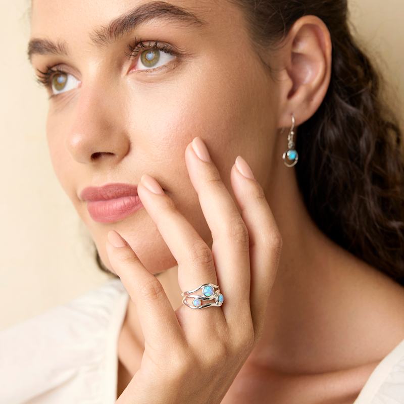 Thumbnail of Three Blue Fire Opal Gemstone Ring image