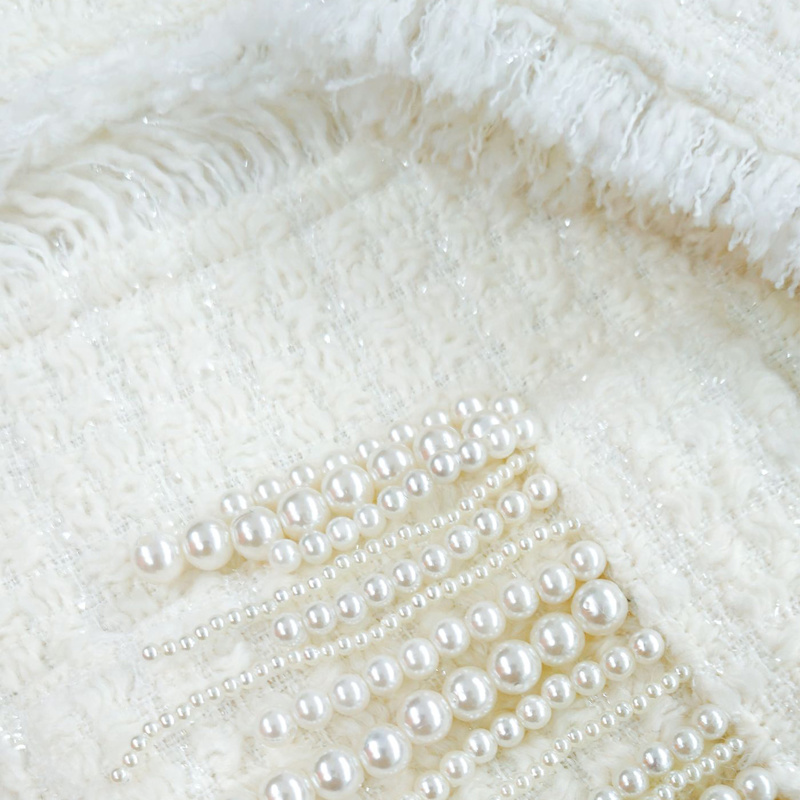 Thumbnail of Tia Mini Skirt In Shimmering White Tweed Bouclé With Pearl Bead Fringe Embellished Pockets image