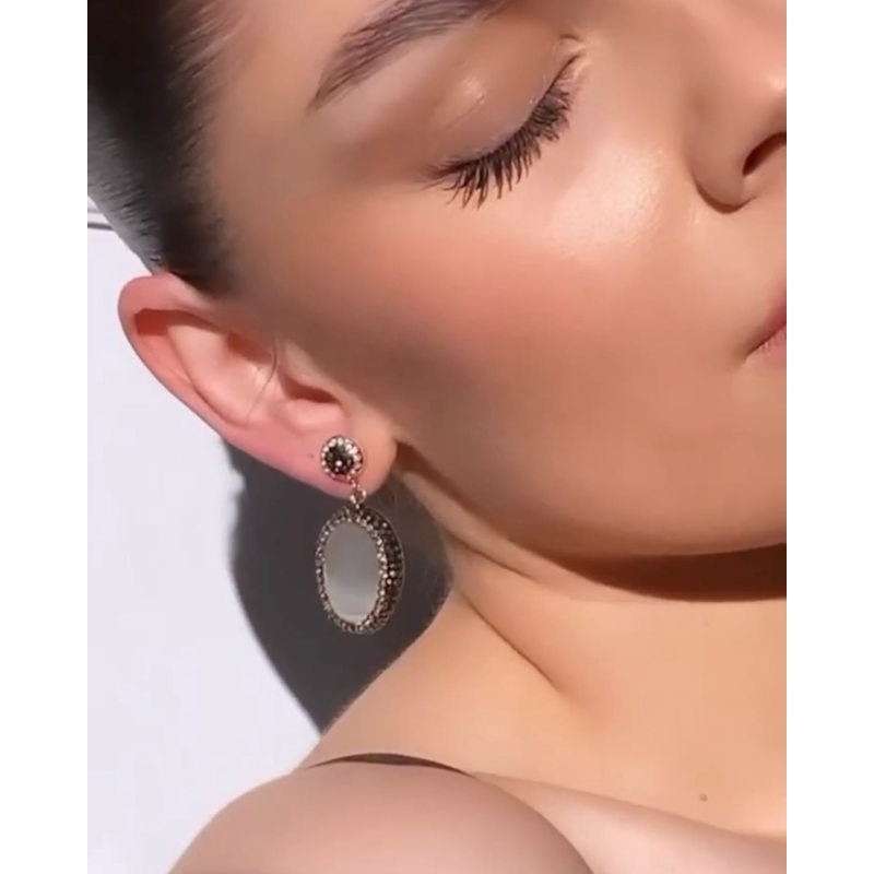 Thumbnail of White Cabochon Single Drop Earrings image