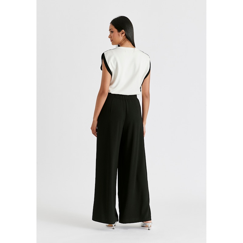Wide Leg Trousers With Side Pleats And Split Hem In Black | PAISIE