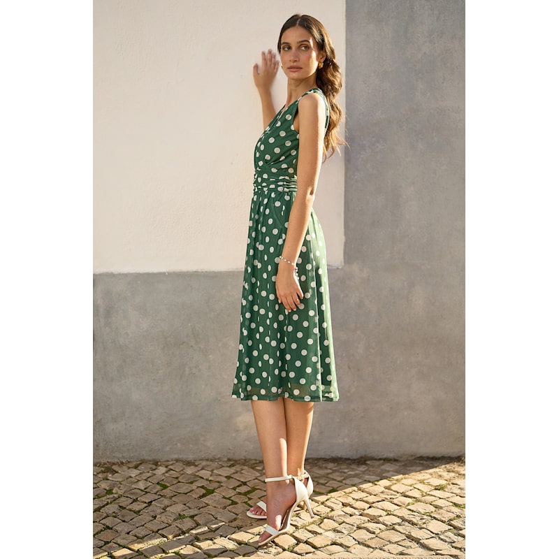 Yumi Green Polka Dot Mesh Wrap Skater Dress With Pockets by Yumi