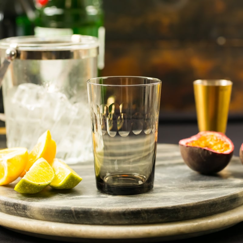 Thumbnail of A Set Of Four Smoky Crystal Tumblers With Lens Design image