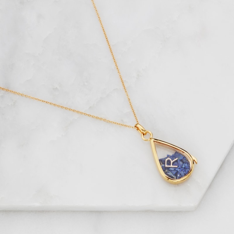 Thumbnail of Gold Glass Amethyst Teardrop Locket image