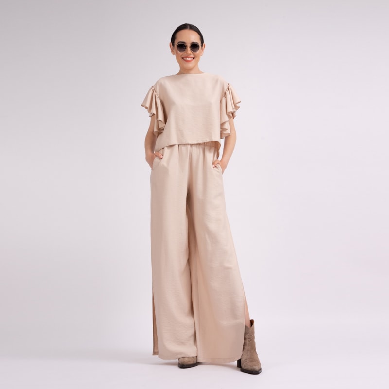 Thumbnail of Beige Set With Ruffled T-Shirt And Trousers With Slits image