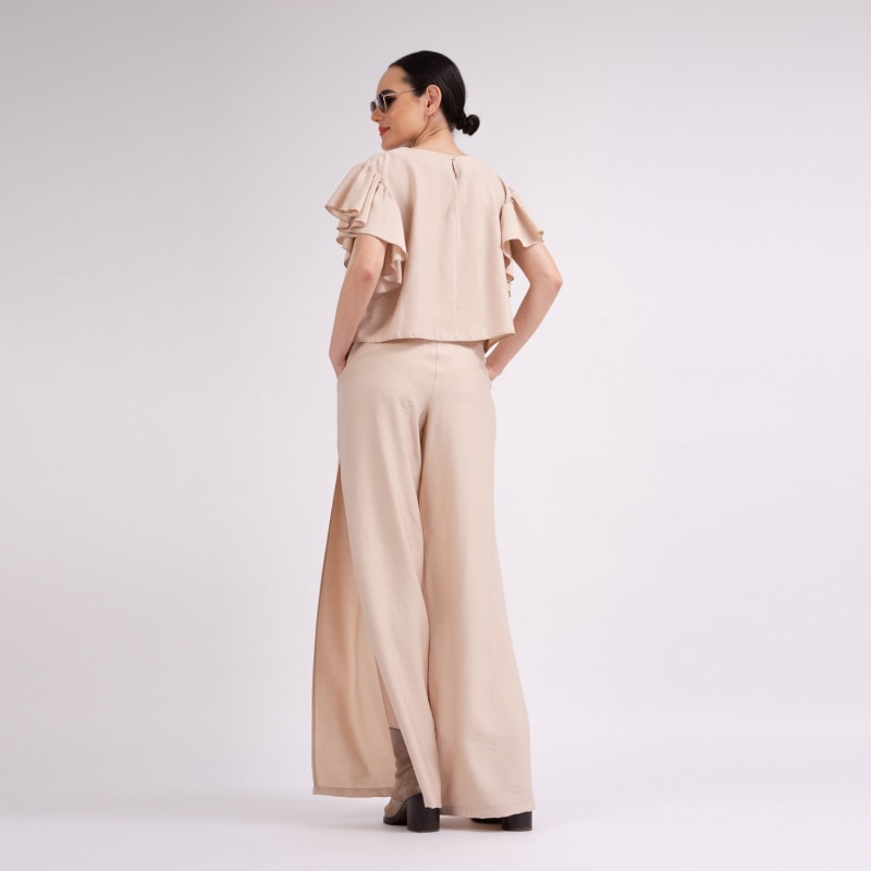 Thumbnail of Beige Set With Ruffled T-Shirt And Trousers With Slits image