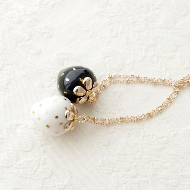 Thumbnail of Golden Black Porcelain Strawberry Necklace image