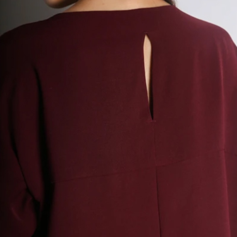 Thumbnail of Sonya Hi Lo Hemline Long Sleeves Top In Wine image