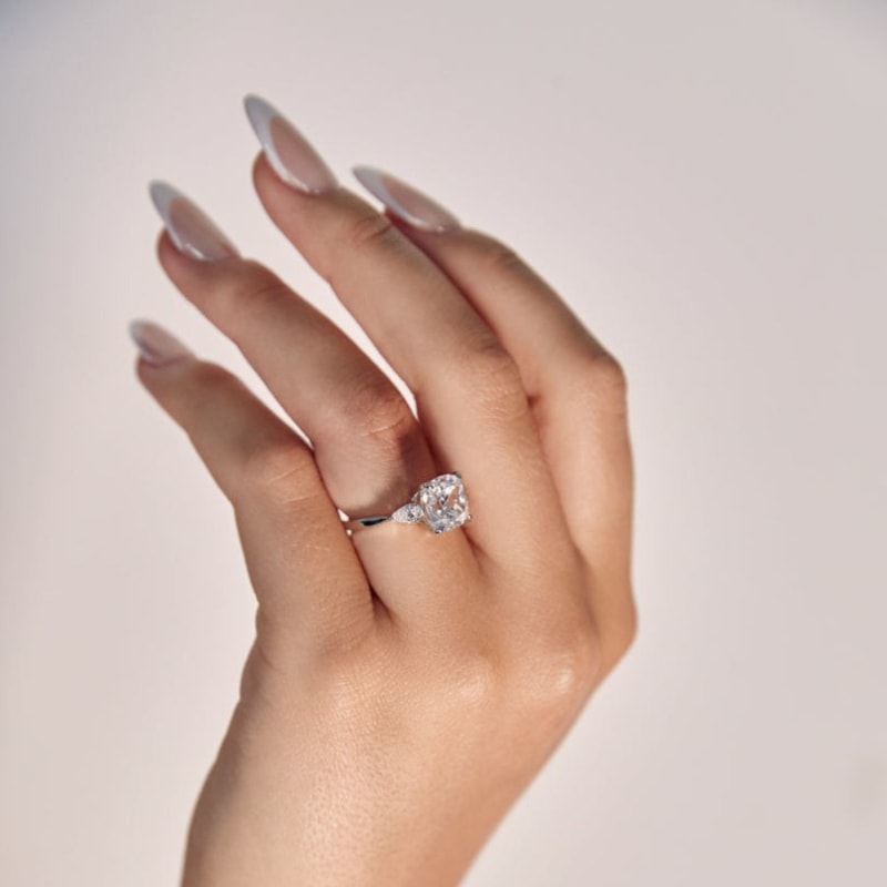 Three stone cushion cut engagement ring outlet