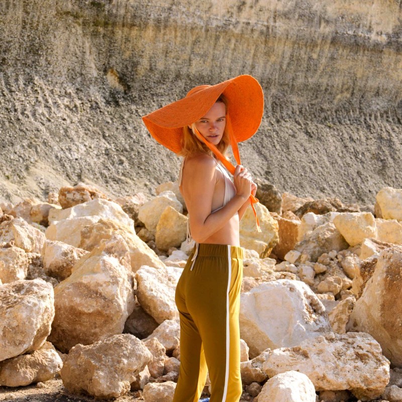 Thumbnail of Lola Wide Brim Jute Straw Hat In Orange image