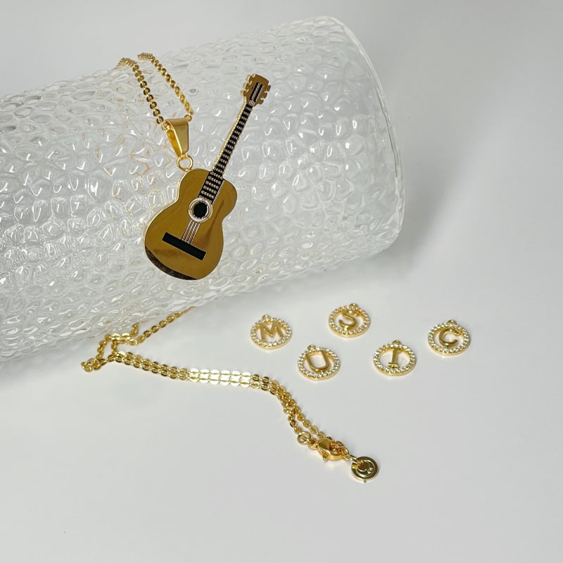 Thumbnail of Enchanted Woods Strum Guitar Necklace image