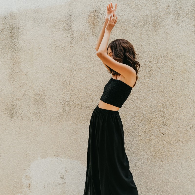 Thumbnail of Judith Smocked And Ruffle Tube Top In Black image