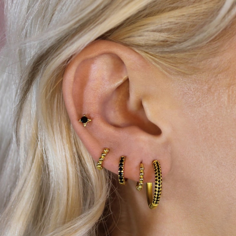 Thumbnail of Mini Black Pavé Gold Huggie Hoop Earrings image