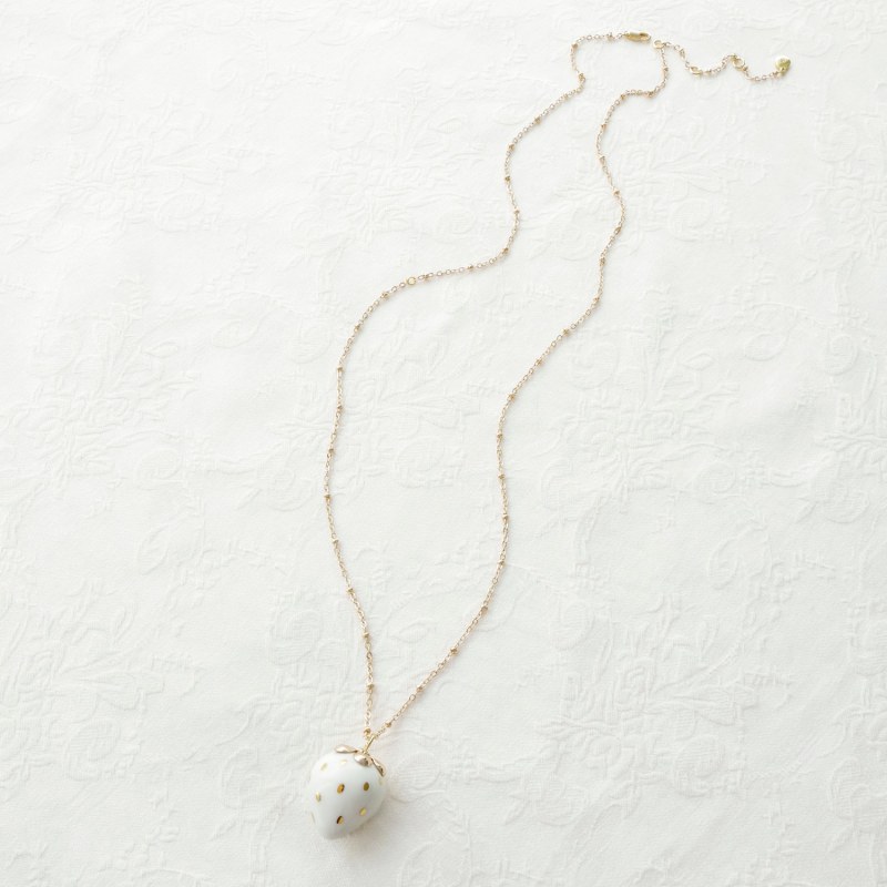 Thumbnail of Golden White Porcelain Strawberry Necklace image