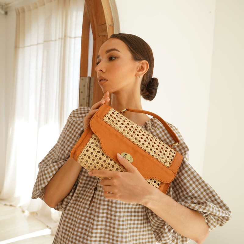 Thumbnail of Audrey Rattan Clutch In Camel image