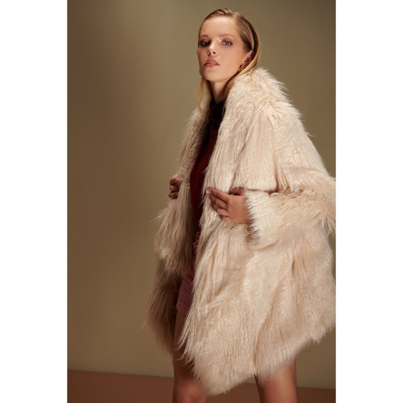 Thumbnail of Emine Asymmetrical Faux Fur Wrap Coat In Beige image