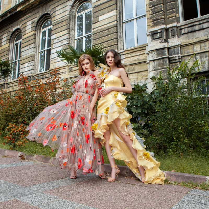 Thumbnail of Pleated Beige Midi Dress With Flower Print image