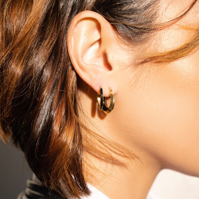 Thumbnail of Petite Enamel Huggie Hoop Earrings In Black image