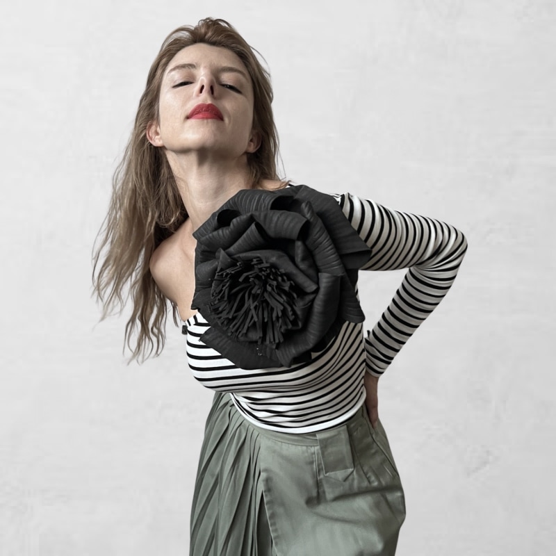 Striped One Sleeve Top With Black Flower Pin | London Striped One Sleeve Top With Black Flower Pin | London