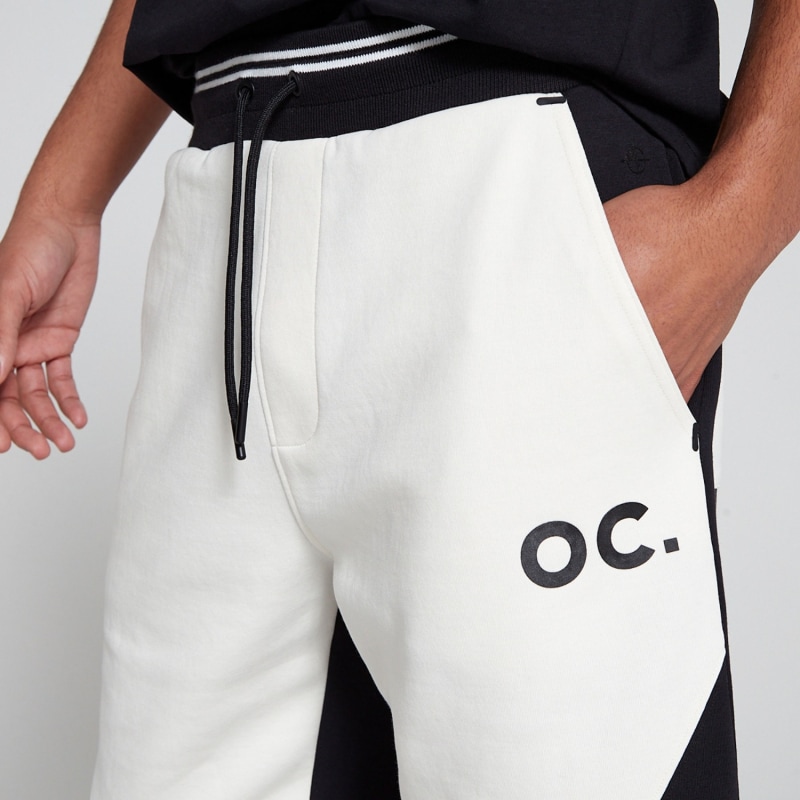 Track 2.0 Retro Zip Pocket Shorts Jet Black by Original Creator