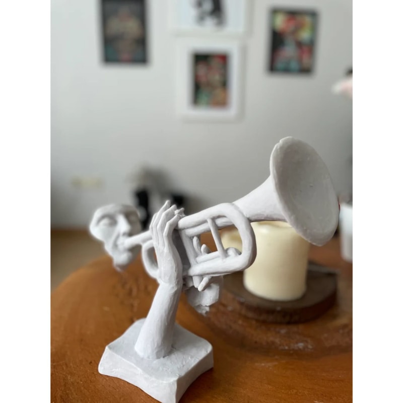 Thumbnail of Trumpet On Man Sculpture image