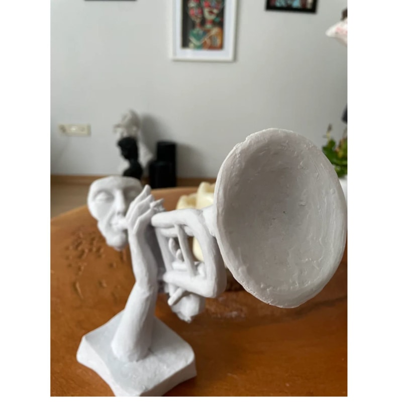 Thumbnail of Trumpet On Man Sculpture image