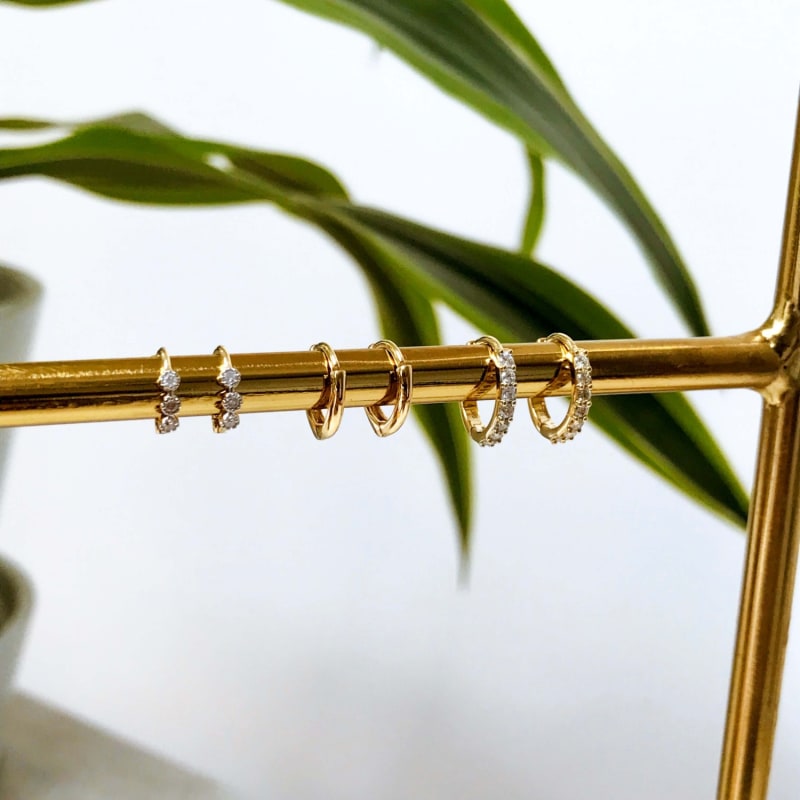 Thumbnail of Mini Diamond Trilogy Huggie Hoop Earring 9K Gold image