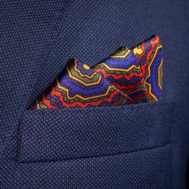 Thumbnail of 'Whirligig' Medallion Silk Pocket Square In Red, Green, Blue & Gold. Full-Size. image