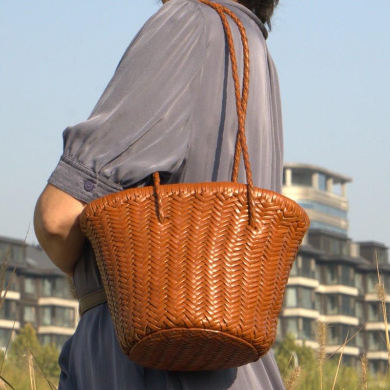 Woven leather bucket bag clearance