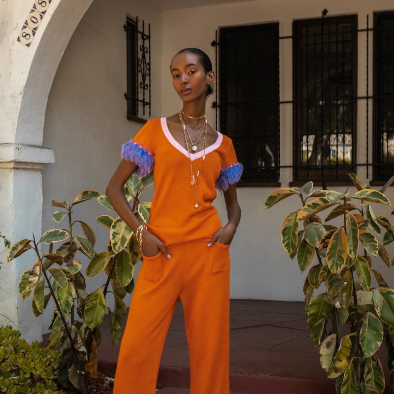 Thumbnail of Orange Top With Handmade Knit Details & Pearl Buttons image