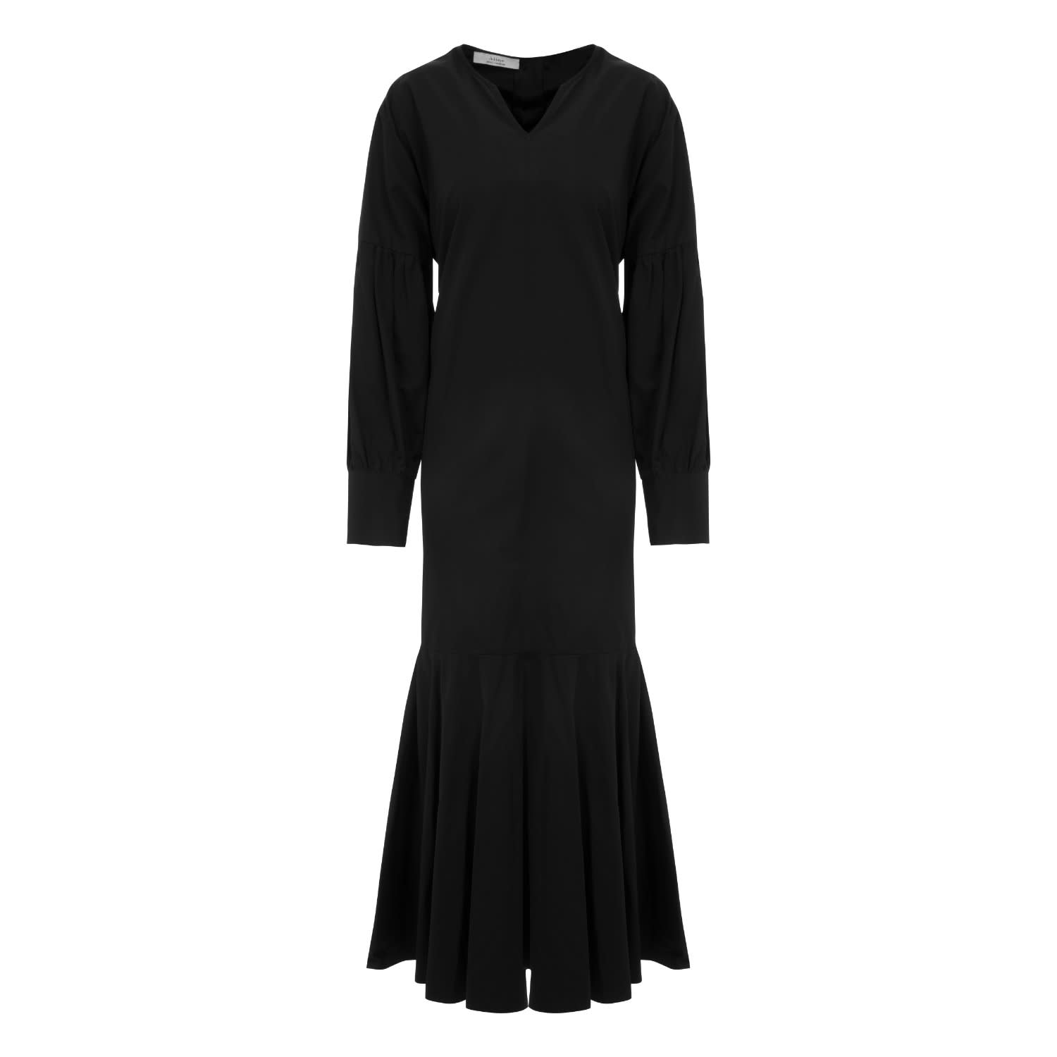 black dress with ruffles at the bottom