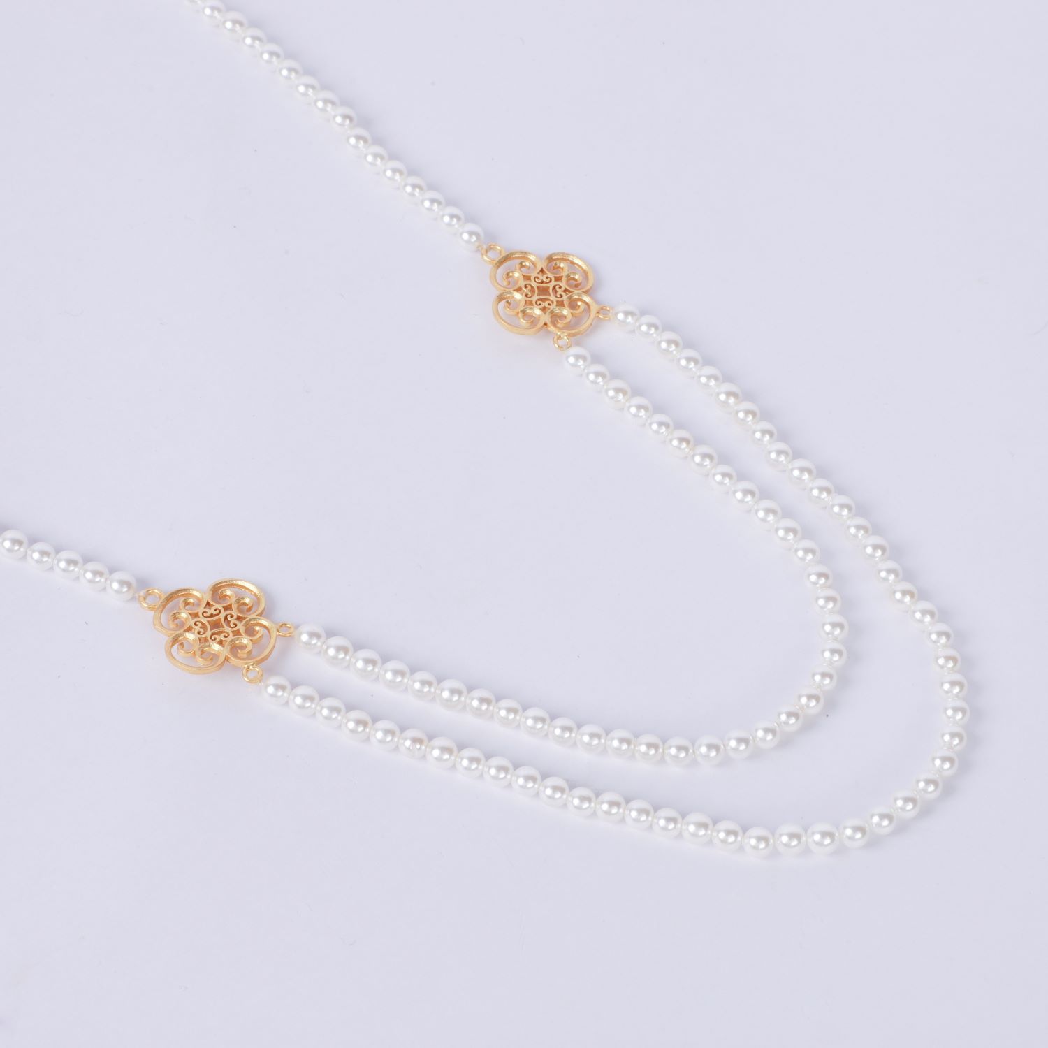 Lila Rasa Women's Gold / White Clover Long Pearl Statement Necklace 25"
