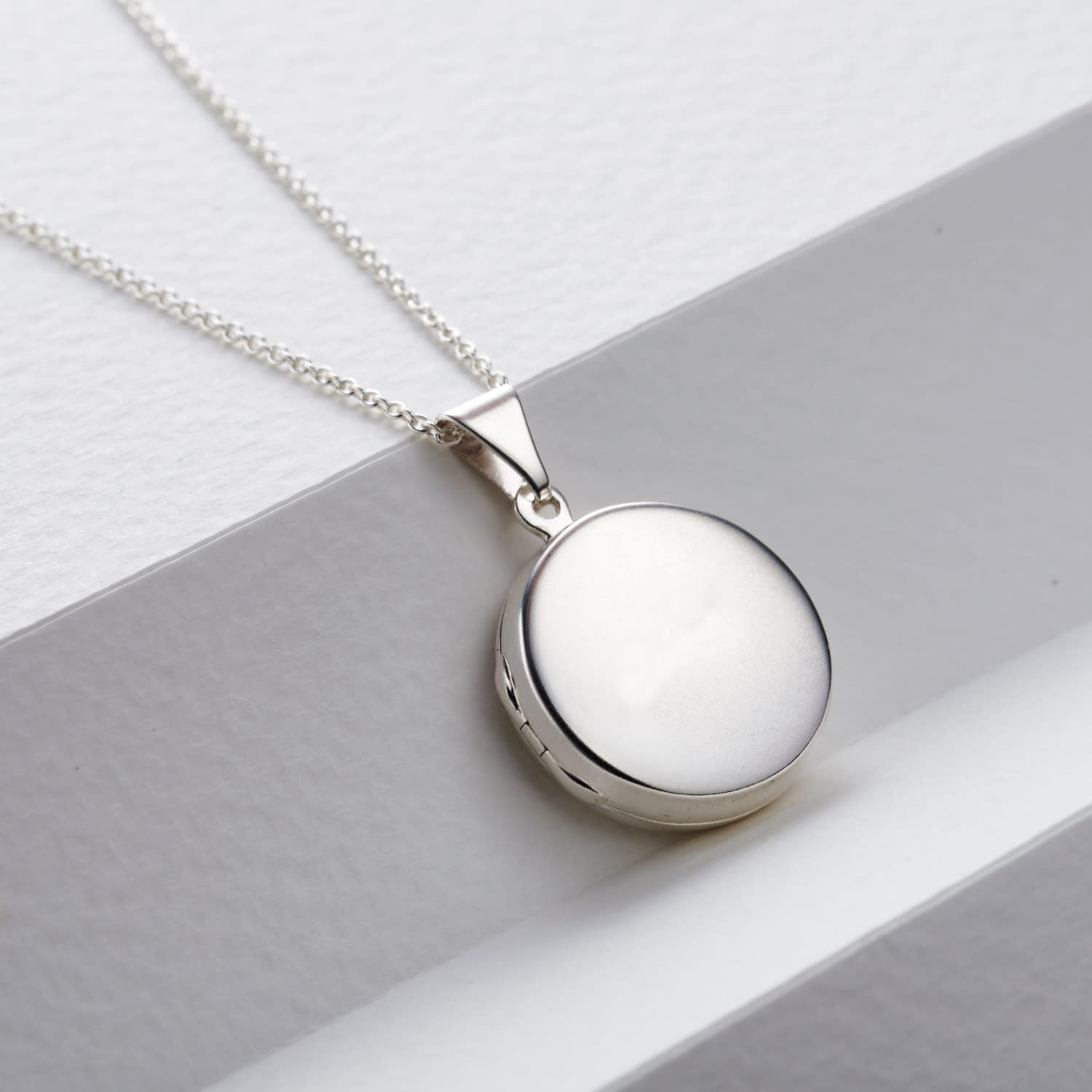 Round hotsell silver lockets
