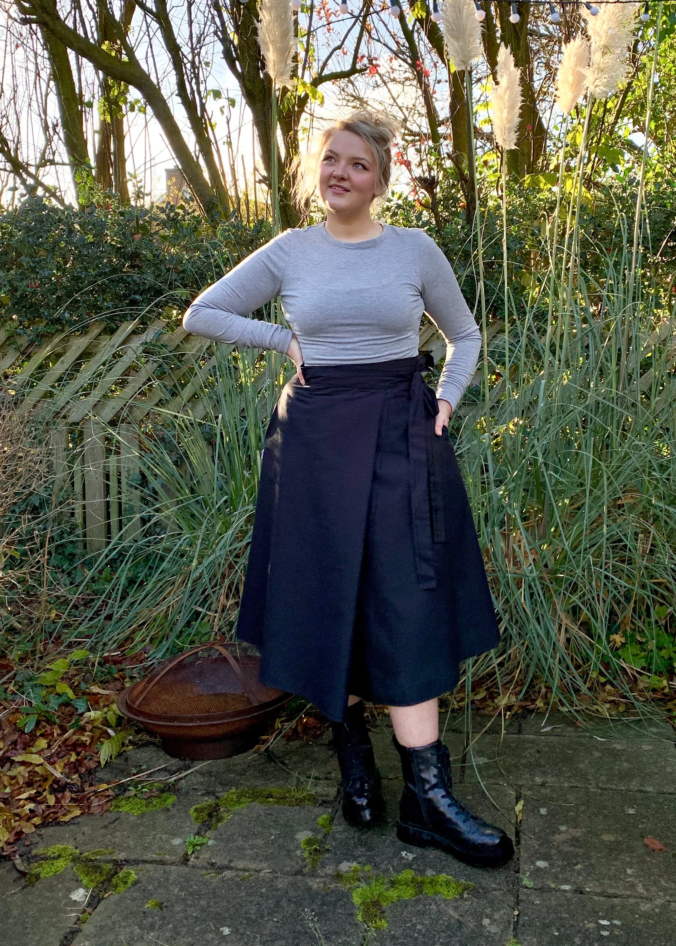 Illusion Wrap Midi Skirt In Black With Pockets | Frock Tales