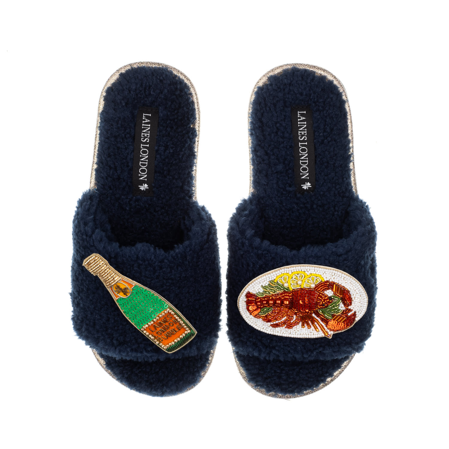 Laines London Women's Blue Teddy Toweling Slipper Sliders With Lobster Platter & Champagne Bottle Brooches - Navy In Blue
