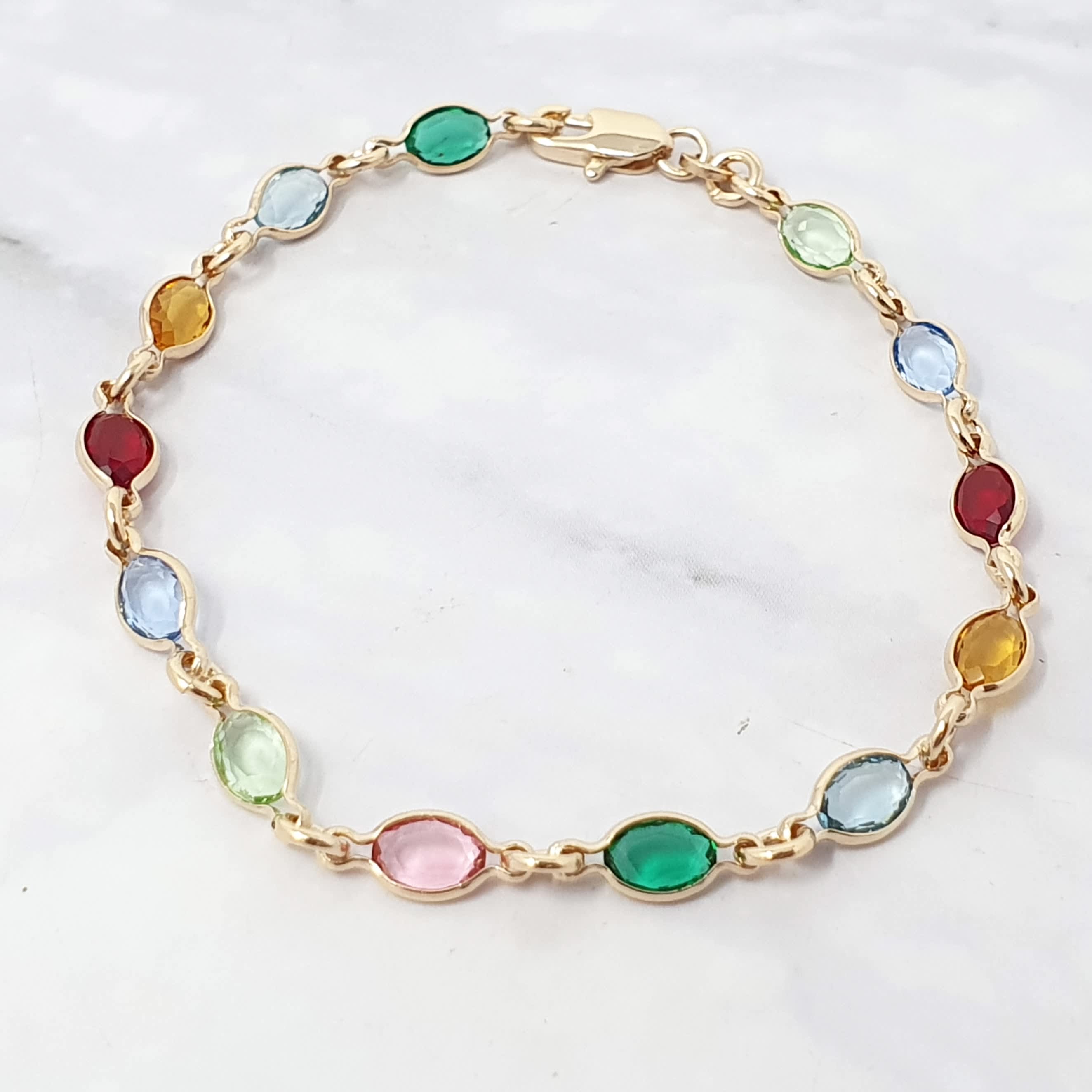 Gold gemstone bracelet discount