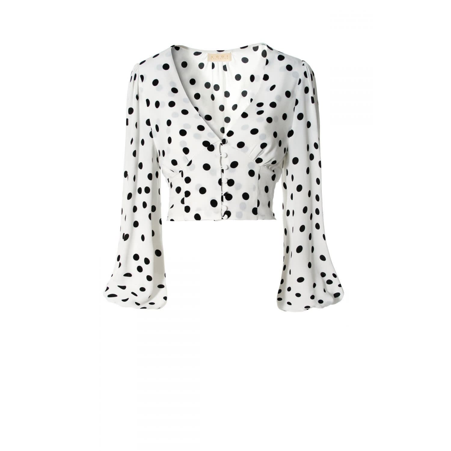 white blouse with black dots