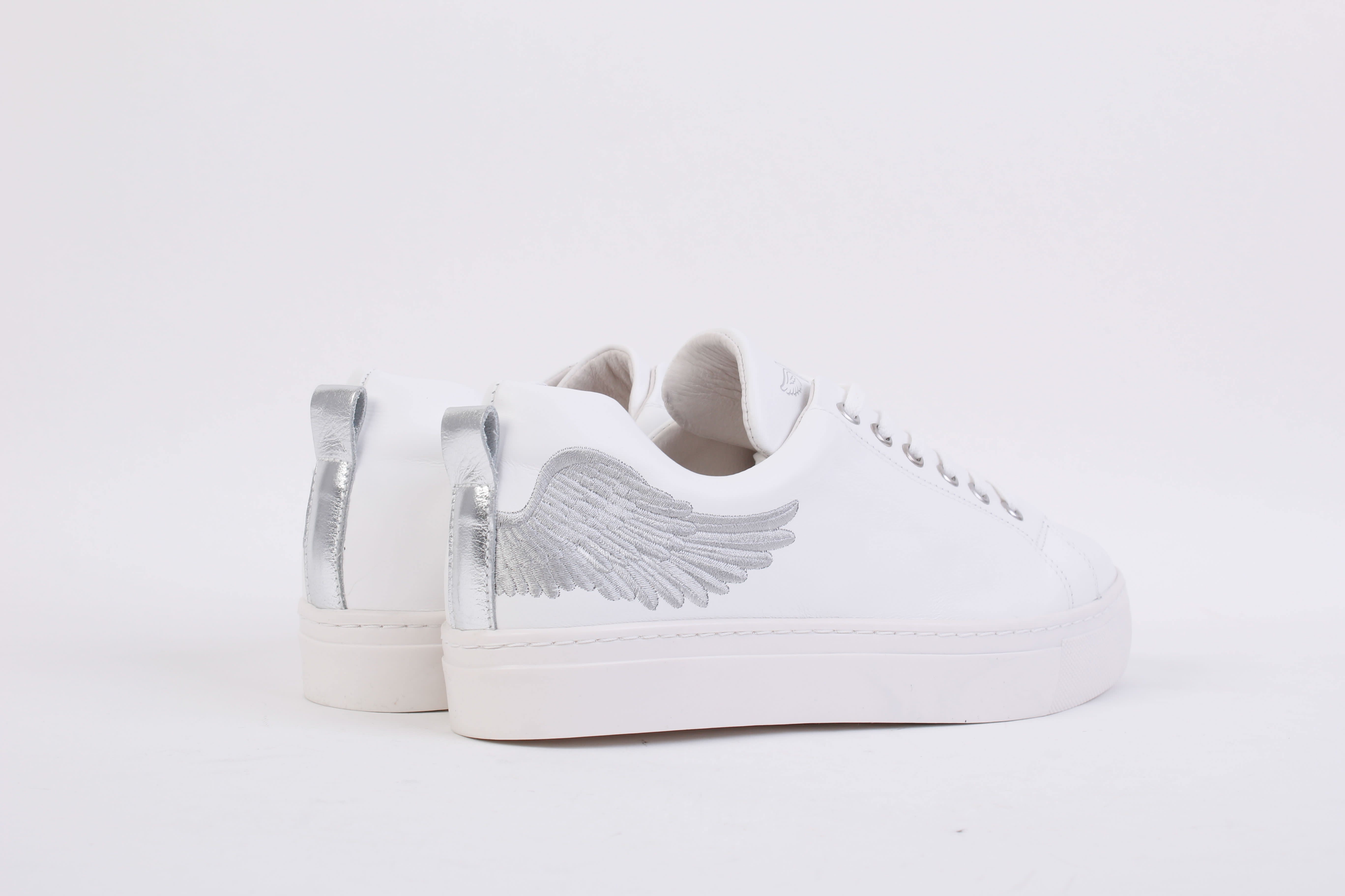 Angel's Ease - Classic Trainer In White With Silver Wing | Marté