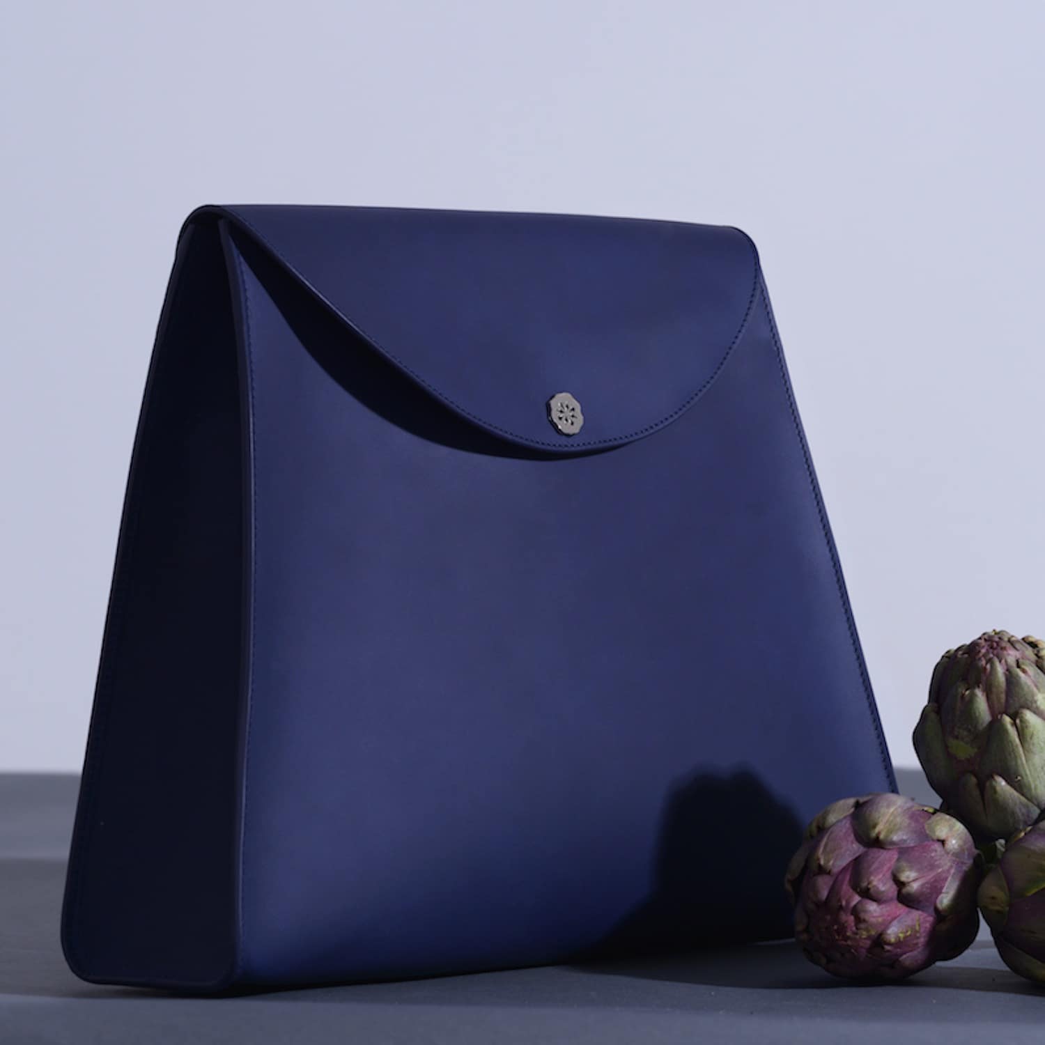 oversized navy clutch bag