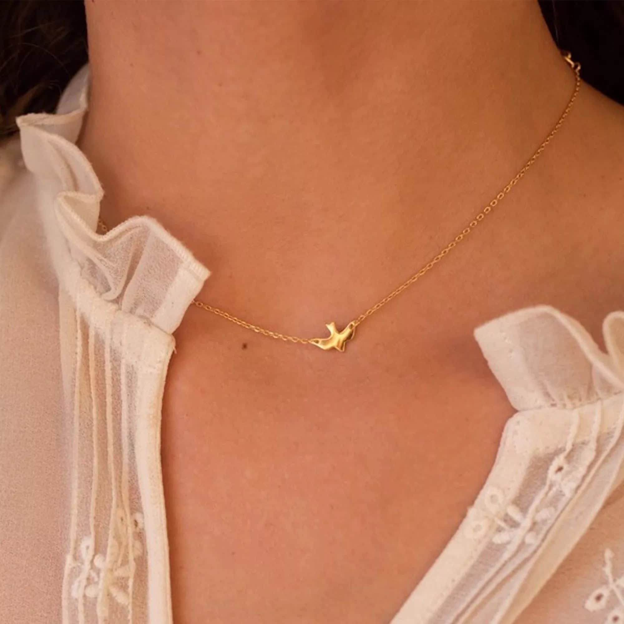 Tiny bird store jewellery