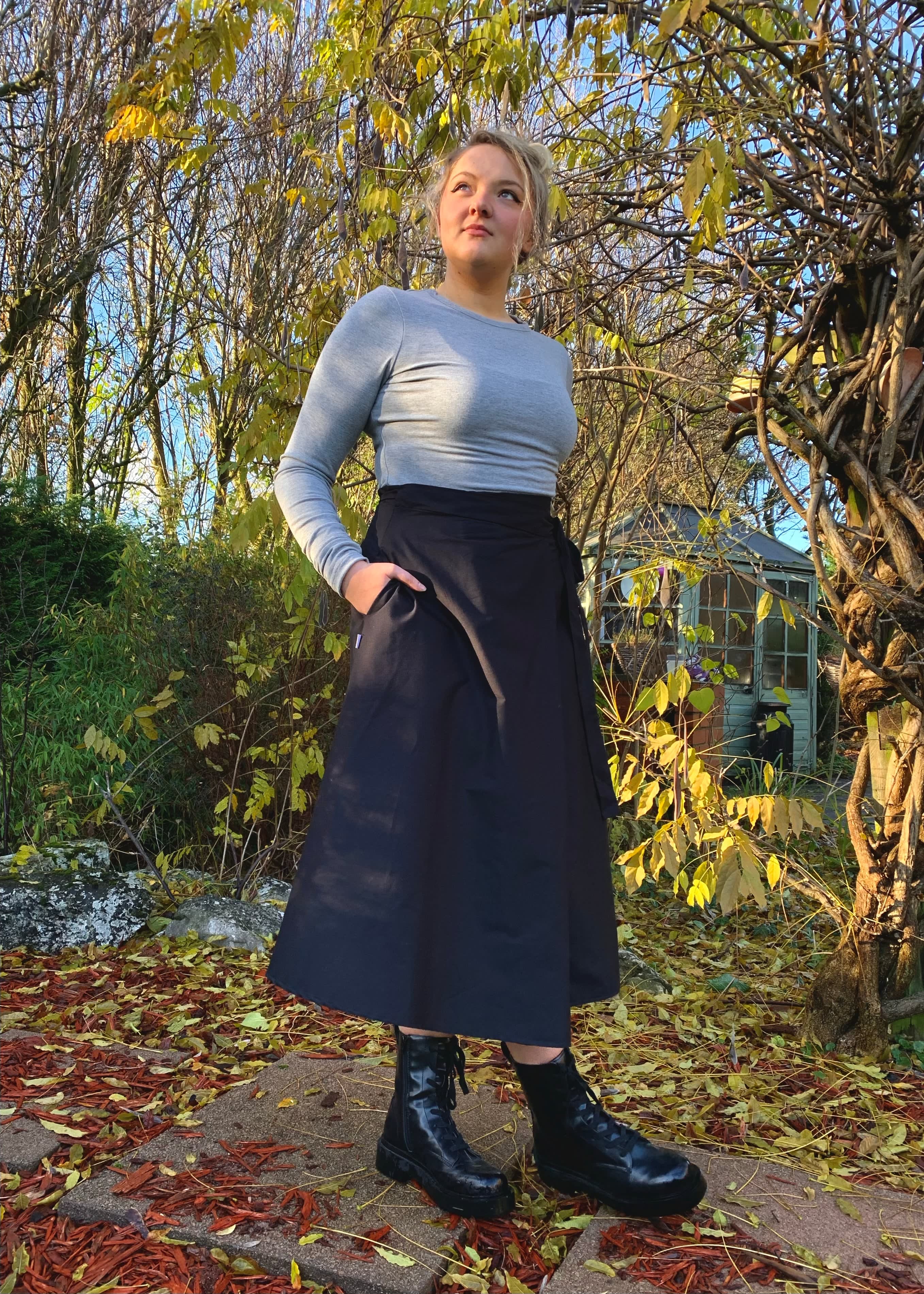 Illusion Wrap Midi Skirt In Black With Pockets | Frock Tales