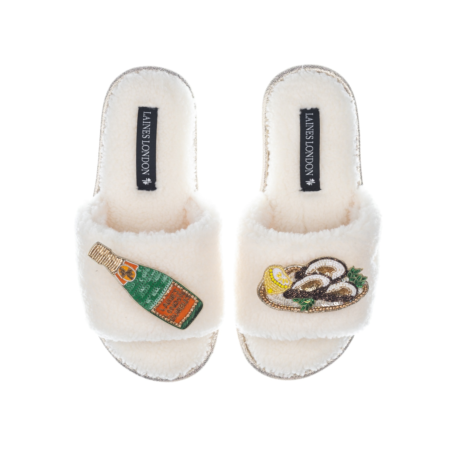Laines London Women's White Teddy Toweling Slipper Sliders With Champers Bottle & Oyster Brooches - Cream In White