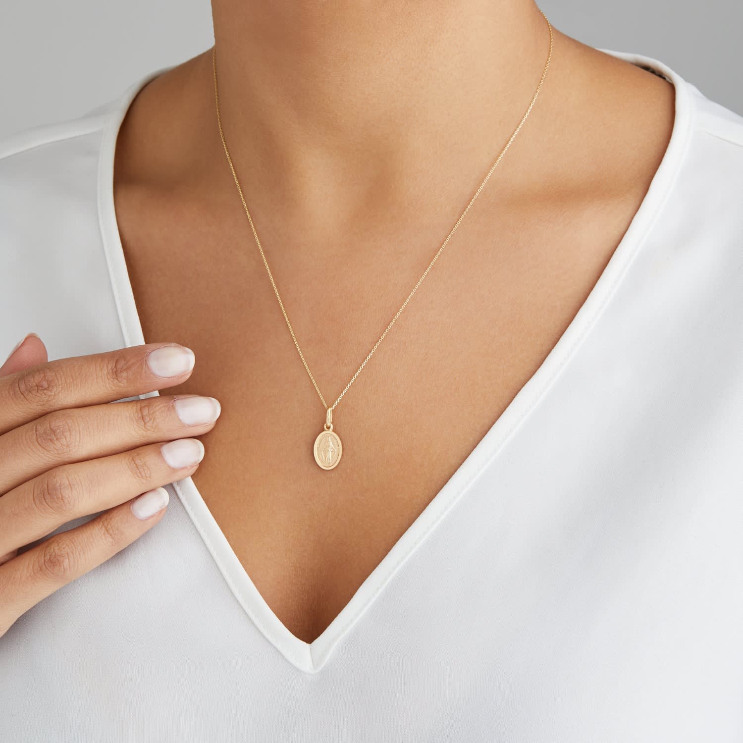 Small Solid Gold Oval Virgin Mary Necklace by Lily & Roo