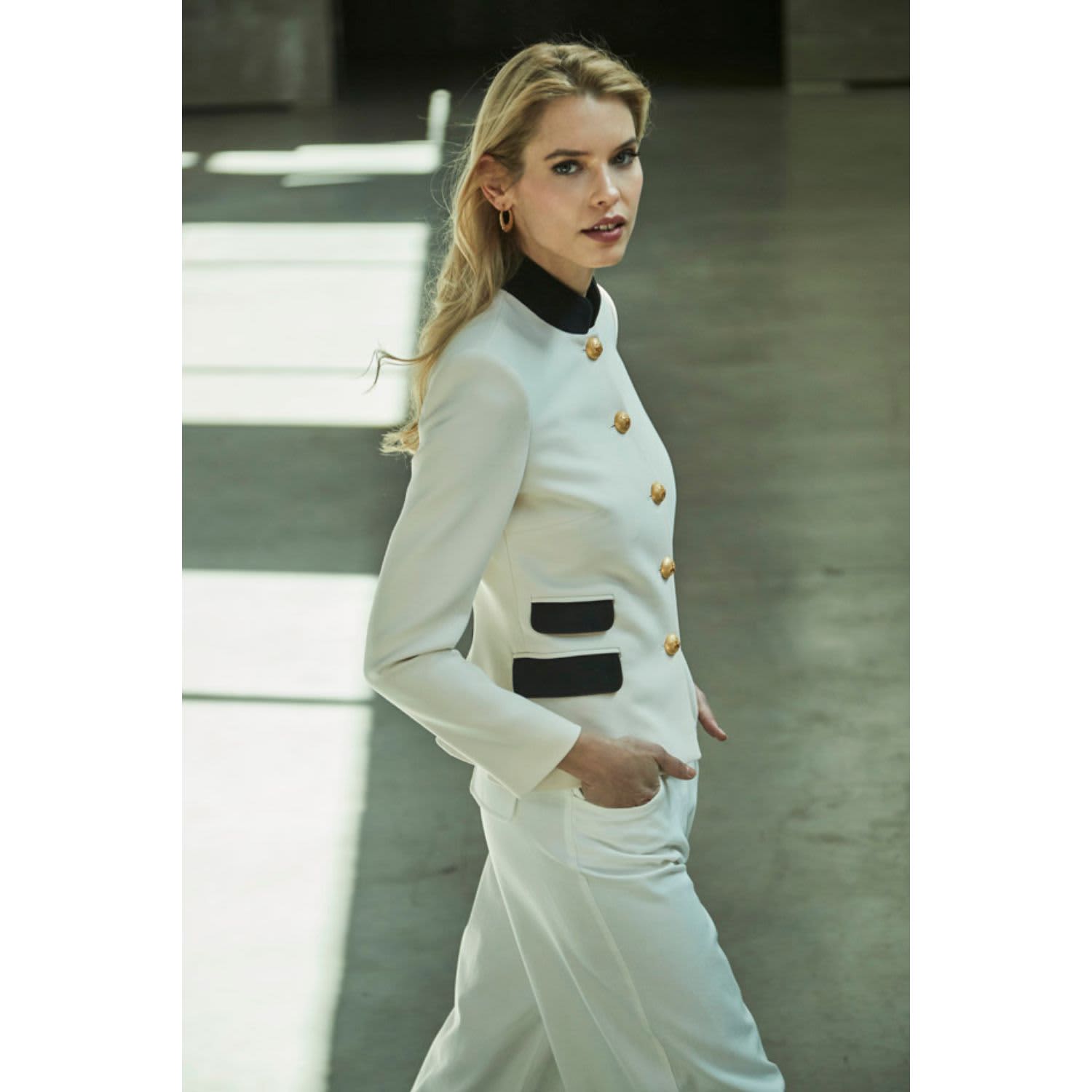 White Blazer With Black Accents And Gold Button Closure